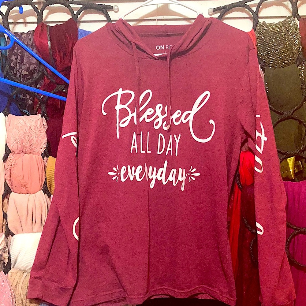 Comfortable burgundy hoodie size large rarely worn selling because I am moving.